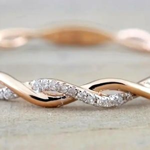 Rose Gold Twisted NEW Ring size 8.